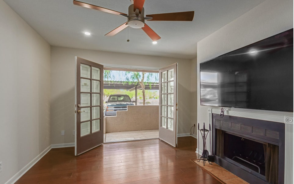 Single-family home in McCormick Ranch Scottsdale with stucco exterior, tile roof, and lush green landscaping